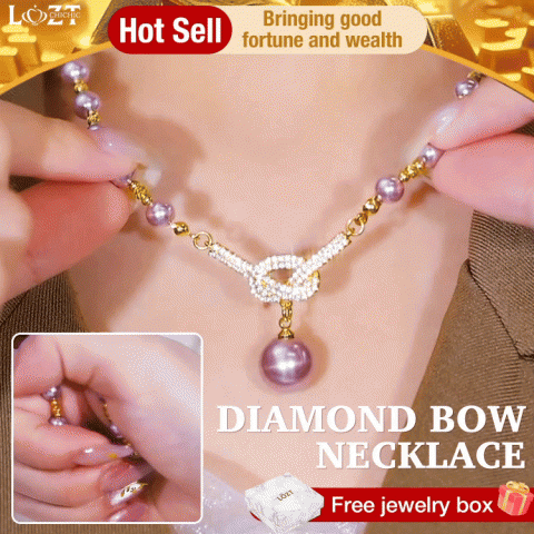 Diamond bow necklace
