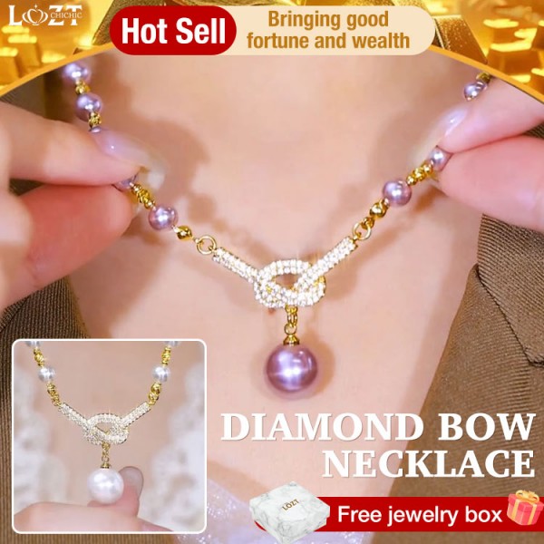 Diamond bow necklace..